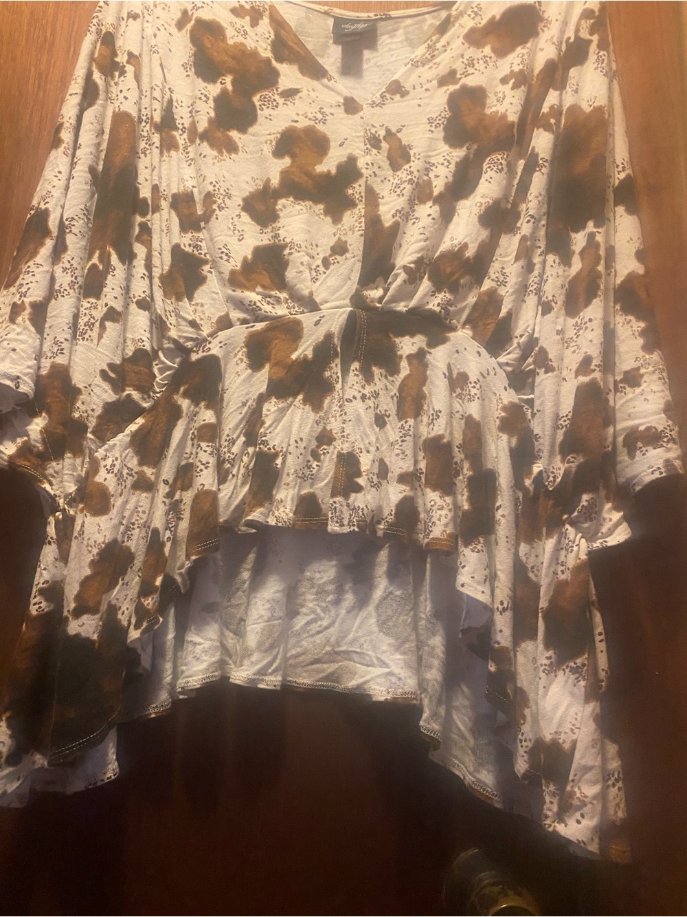 Daytrip Buckle Cow Print Top,” “XXL V-neck - Picture 2 of 3